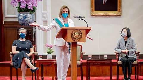 US House of Representatives Speaker Nancy Pelosi speaks next to Taiwan President