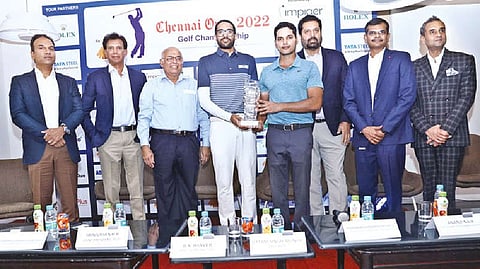Indian professional golfers Karandeep Kochhar and Manu Gandas pose with the trophy on Monday. (left to right) Other dignitaries in the frame are: Sambhu Prasad Sivalenka, HR Srinivasan, RK Jhaver, Uttam Singh Mundy, V Ramakrishnamoorthy and Anand Nair.