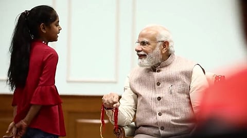 Daughter of PMO staff with PM Modi