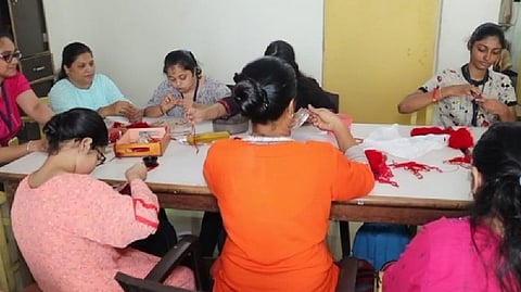 Divyang children making Rakhi