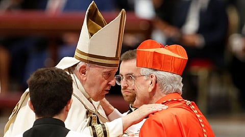 Pope Francis greets Leonardo Ulrich Steiner during a consistory ceremony to elevate Roman Catholic prelates to the rank of cardinal, at Saint Peter's Basilica at the Vatican.