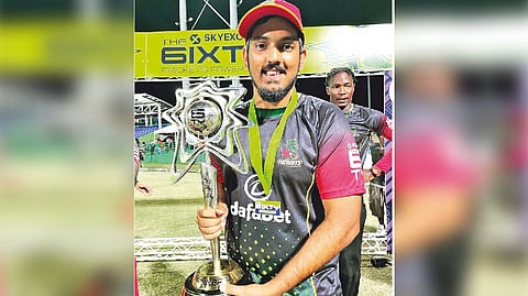 Malolan Rangarajan with The 6IXTY trophy