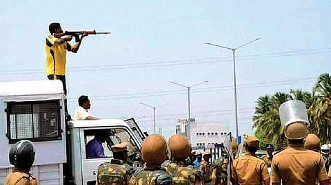 An officer targeting civilians during anti-Sterlite protests
