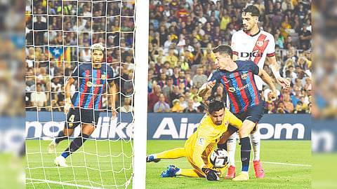 Barcelona?s Robert Lewandowski tries to score on his debut
against Rayo Vallecano