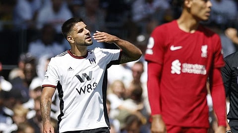 Fulham's Aleksandar Mitrovic celebrates scoring their second goal as Liverpool's Virgil van Dijk looks on Action