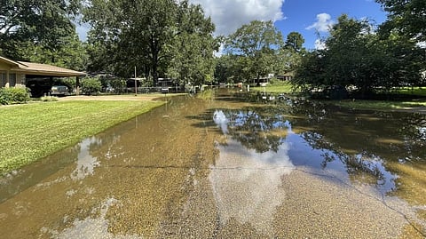 Floodwaters covered the streets in some parts of the North Canton Circle neighborhood of Jackson