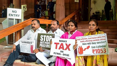 Congress MPs Manickam Tagore, TN Prathapan, Jothimani, and Ramya Haridas stage a protest over the price hike of fuel and LPG gas cylinders, and an increase in GST on essential commodities during the ongoing Monsoon Session of Parliament, in New Delhi, July 27, 2022.