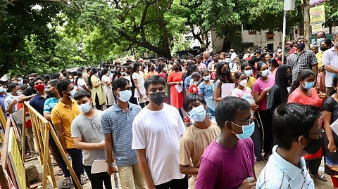 Students standing in queue at a centre in Nungambakkam