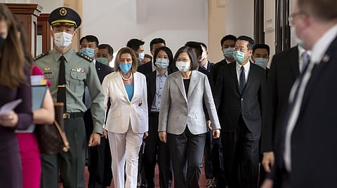 U.S. House Speaker Nancy Pelosi, center left, and Taiwanese President President Tsai Ing-wen arrive for a meeting in Taipei, Taiwan