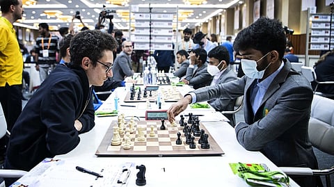Gukesh D playing against USA's Grandmaster Fabiano Caruanain in 8th round of Chess Olympiad.