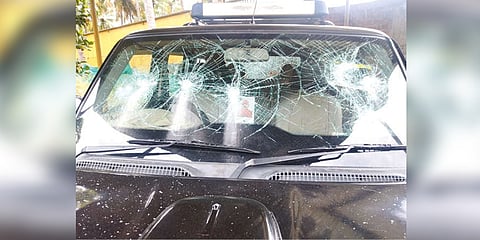 Damaged car of a BJP functionary in Theni
