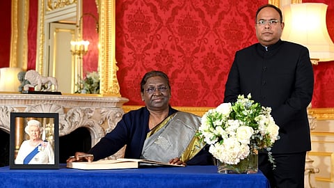President Droupadi Murmu and Acting High Commissioner Sujit Ghosh signs a book of condolences at Lancaster House following the death of Queer Elizabeth II, in London