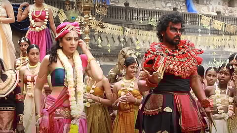 Karthi as Vanthiyathevan and Sobhita Dhulipala as Vanathi in Mani Ratnam's Ponniyin Selvan.