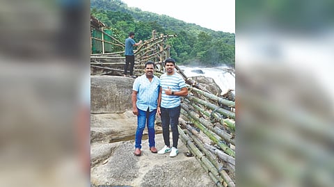 Tamil Thalaivas head coach J Udaya Kumar (left) with new recruit Pawan Sehrawat