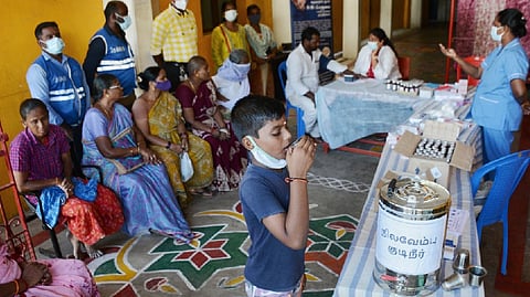 A child having Nilavembu drink
