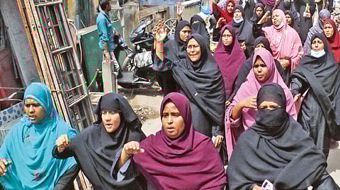 Muslim women taking out a protest rally against PFI ban