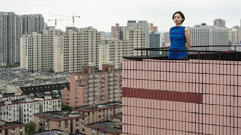 Qu Tongzhou, a photography assistant in Shanghai