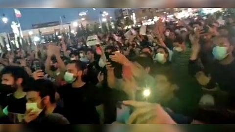 The protesters set fire to big waste containers and blocked access to some streets, while shouting slogans against the Supreme Leader.