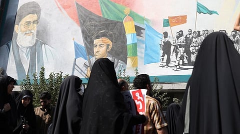 Iran's Supreme Leader Ayatollah Ali Khamenei is seen on a building during a rally against the recent protest gatherings in Iran