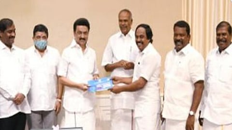 State Information Technology Minister Mano Thangaraj handed over a modern desktop computer, user ID and password to the Chief Minister