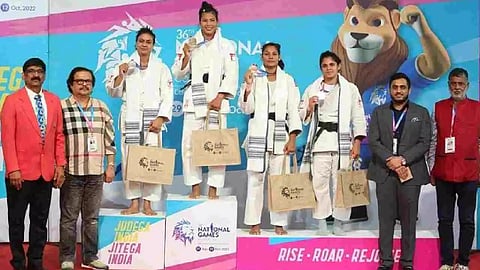 Judo medallists pose with their winnings on Sunday