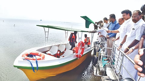 Minister for School Education Anbil Mahesh inaugurating boating service at Manora in Pattukkottai on Thursday