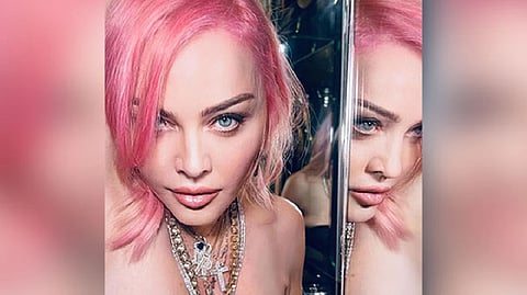Madonna strikes a nude pose, check out her latest pics