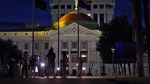 Protesters gather outside the Capitol to voice their dissent with an abortion ruling.