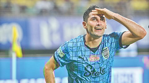 Jorge Pereyra Diaz reacts after scoring against his former club.