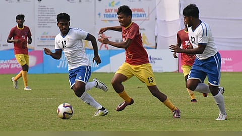 Kerala in action against Karnataka during semi-final of 36th National Games