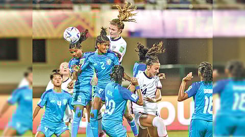 India and USA players in action in the Group A contest