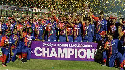 India Capitals players with the trophy