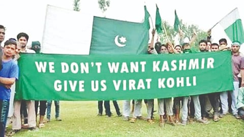 Group of men posing with the Pakistani flag along with a green banner went viral.