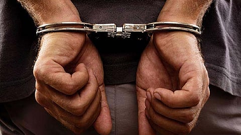 Man arrested for harassing college student