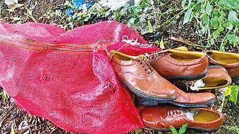 Sack full of police shoes found in garbage dump
