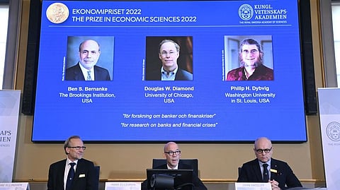 From left, Tore Ellingsen, Hans Ellegren and John Hassler members of the Royal Swedish Academy of Sciences announce the Sveriges Riksbank Prize in Economic Sciences in Memory of Alfred Nobel 2022, during a press conference at the Royal Swedish Academy of Sciences in Stockholm.
