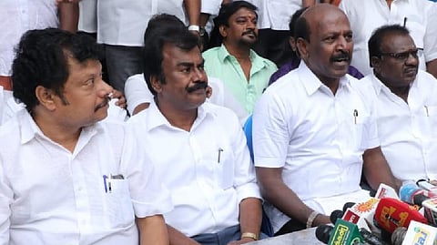 Ma Subramanian addressing the press after distributing mosquito nets in Saidapet