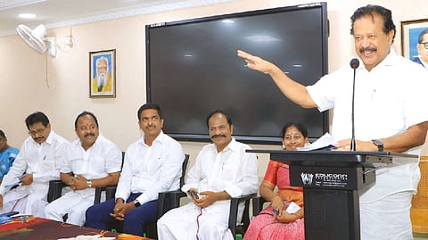 Higher Education Minister K Ponmudy interacting with students of Muthurangam Government Arts College in Vellore on Monday.