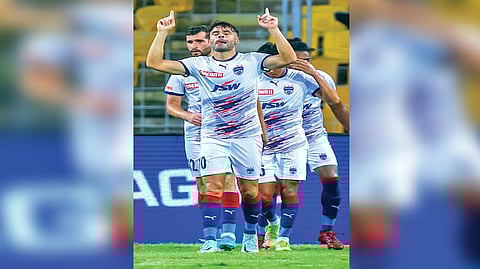 Javi Hernandez celebrates after opening the scoring