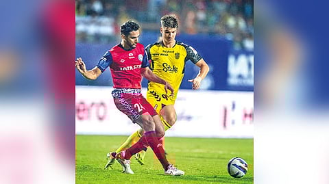 Action during Hyderabad and Jamshedpur match.