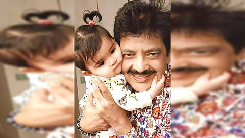 Udit Narayan with his grand-daughter