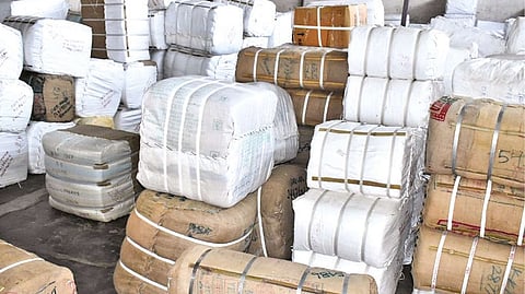 Good stagnating at a booking office in Erode on Friday