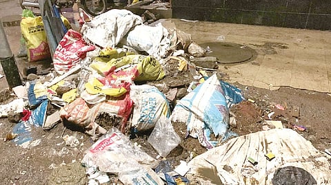 Uncleared sand bags after SWD works in Mahalakshmi Nagar, Porur.