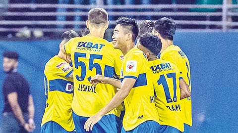 Kerala Blasters FC players celebrate the victory over FC Goa