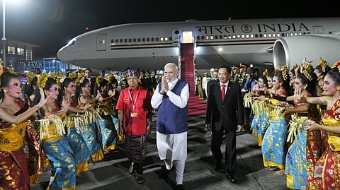 The Prime Minister received a traditional welcome as he arrived in Bali.