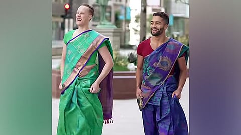 The two are then seen wearing vibrant sarees as they gracefully stroll down Michigan Avenue in Chicago to attend the wedding.