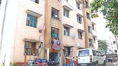 Police team searching a house at the TNSCB tenement in Ukkadam, Coimbatore on Wednesday