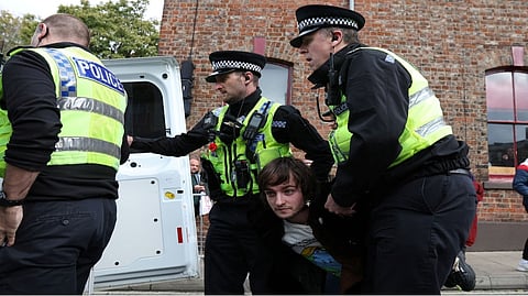 Police detain man after eggs thrown at King Charles