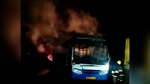 Smoke emerging from the bus in question