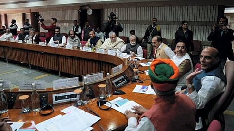 Defence Minister Rajnath Singh with Union Minister for Parliamentary Affairs Pralhad Joshi and other leaders during an all-party meeting ahead of the Winter Session of Parliament, at Parliament House in New Delhi.